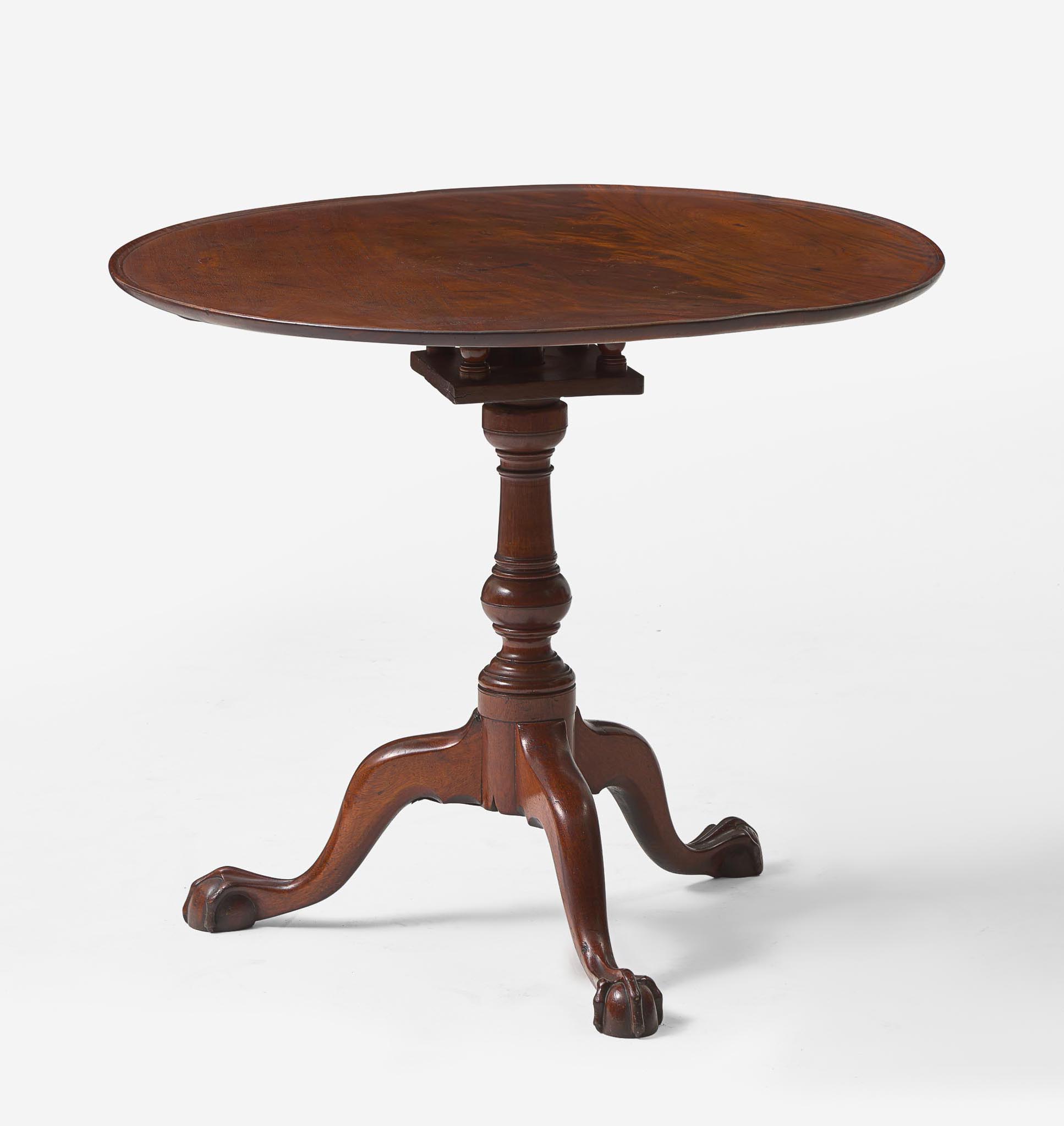 A Chippendale carved mahogany tilt-top tea table