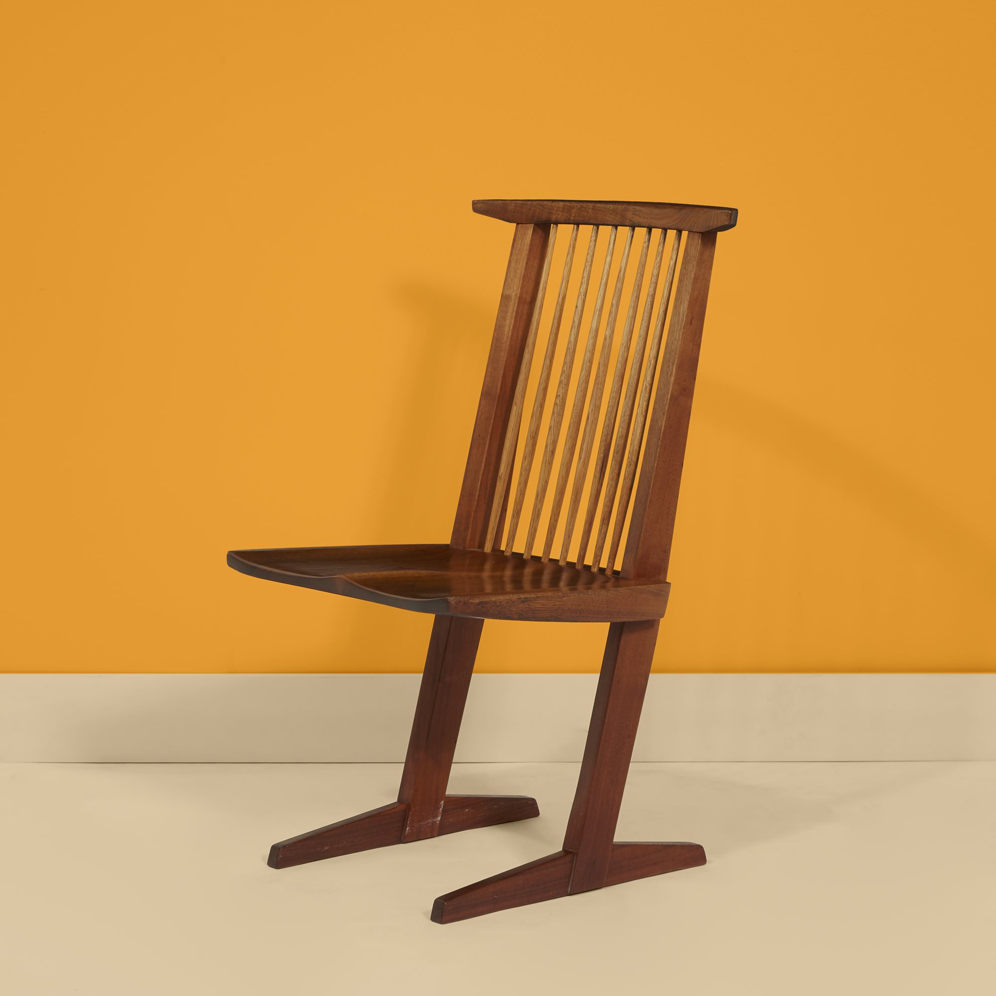 Lot 32  |  George Nakashima (American, 1905-1990), Conoid Chair, New Hope, Pennsylvania, 1967, $3,000-5,000