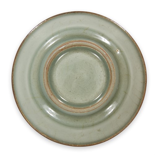 Lot 50 - A Chinese Longquan celadon small circular brush washer