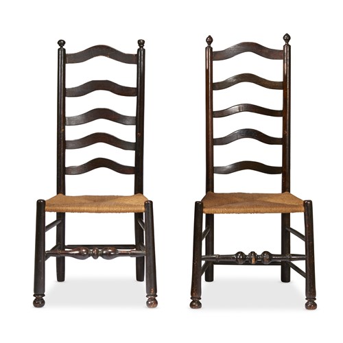 Lot 34 - Assembled pair of turned and painted ladderback and rush seat side chairs