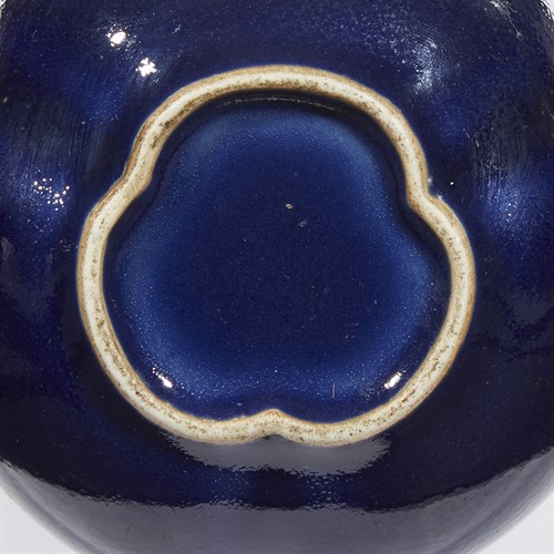 Lot 143 - A Chinese cobalt blue-glazed tri-lobed double-gourd vase