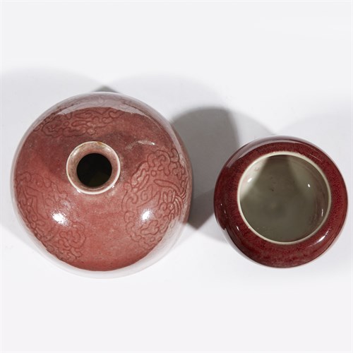 Lot 150 - A Chinese copper red-glazed water coupe, taibo zun, and an alms bowl-form small water coupe