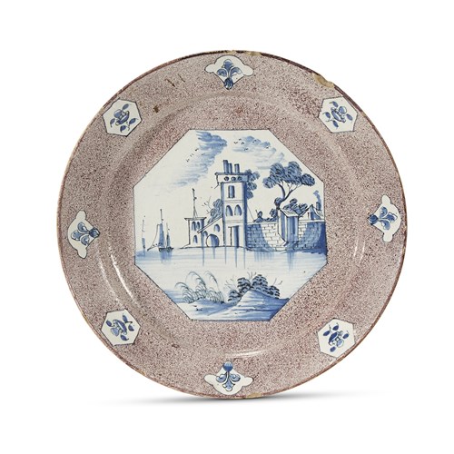Lot 85 - Delft manganese and blue decorated charger