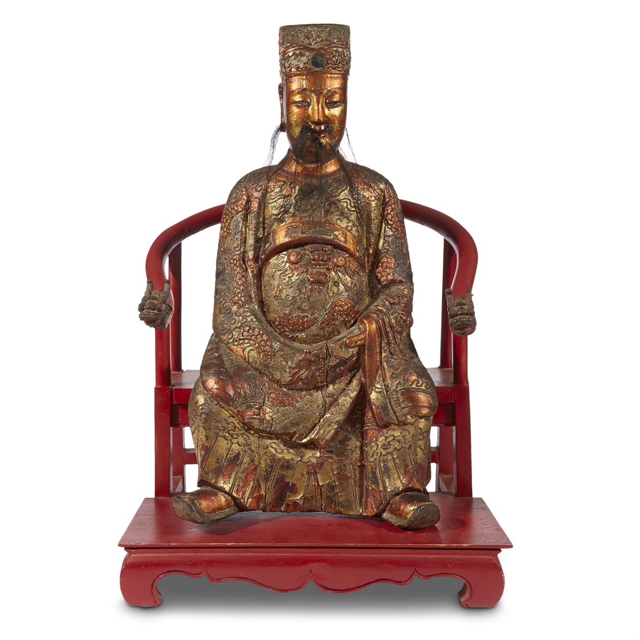 Lot 179 - A Chinese gilt lacquered wood figure of a dignitary on later horseshoe-back seat