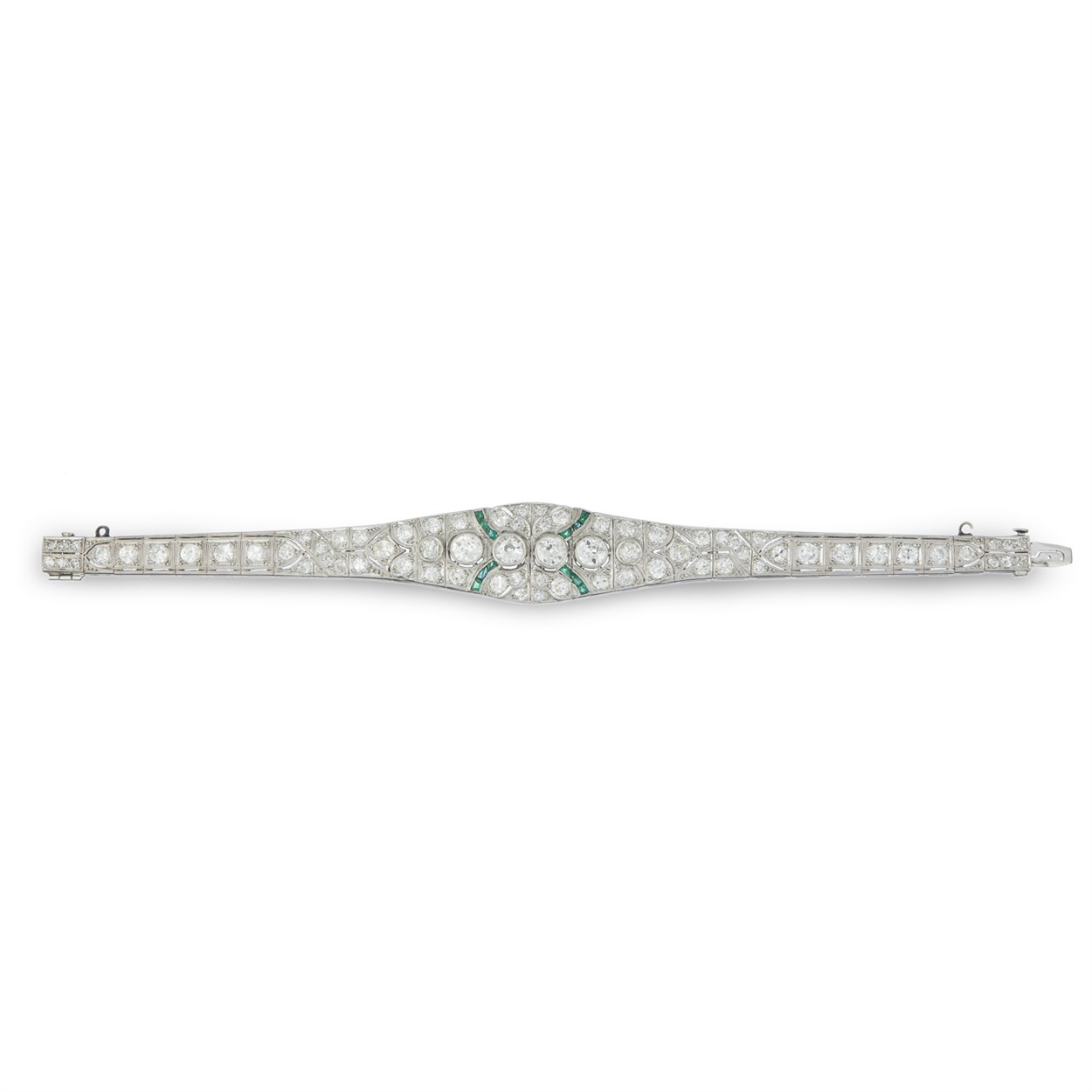 Lot 42 - An Art Deco platinum, diamond, and emerald bracelet