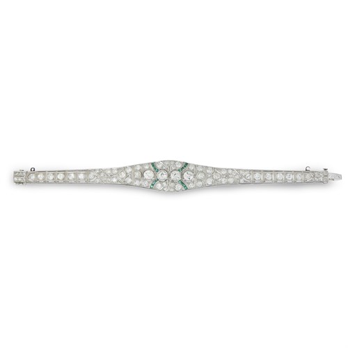 Lot 42 - An Art Deco platinum, diamond, and emerald bracelet