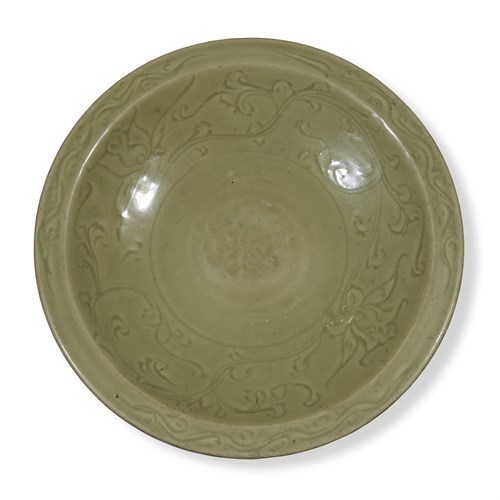 Lot 63 - A Chinese Lonquan molded and incised celadon circular large dish