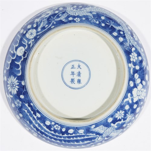 Lot 165 - A Chinese blue and white "Dragons and Phoenix" dish