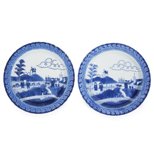 Lot 117 - A pair of Chinese export blue and white porcelain "Deshima Island" dishes