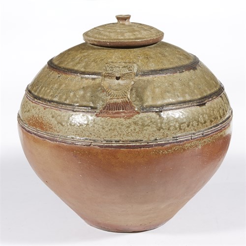 Lot 7 - A Chinese partly-glazed stoneware jar and cover