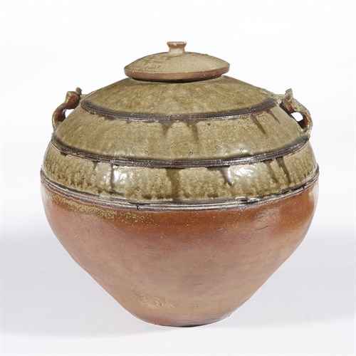 Lot 7 - A Chinese partly-glazed stoneware jar and cover