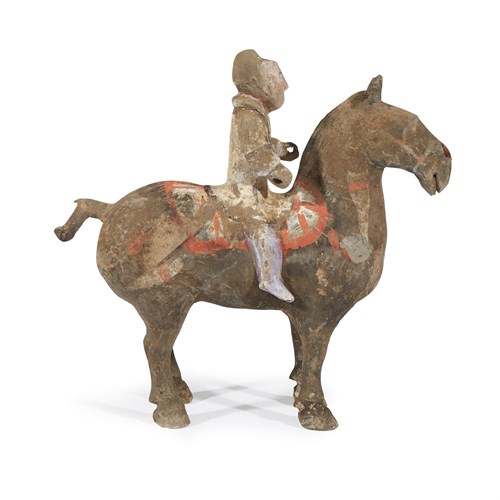 Lot 6 - A Chinese painted grey pottery horse and rider, Shaanxi province
