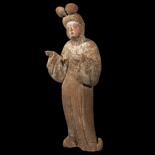 Lot 21 - A Chinese painted pottery figure of a court lady