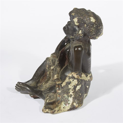 Lot 85 - An unusual mother of pearl-embellished lacquered bronze figure of Liu Hai and toad