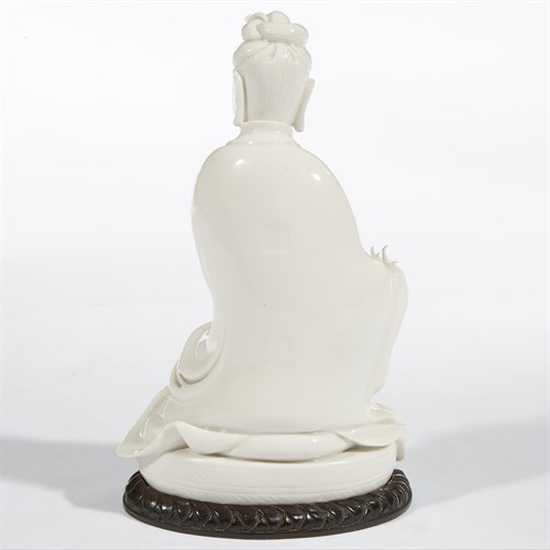 Lot 109 - A Chinese Dehua porcelain figure of Guanyin seated