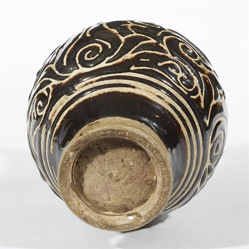 Lot 44 - A Chinese incised black-glazed stoneware bottle vase