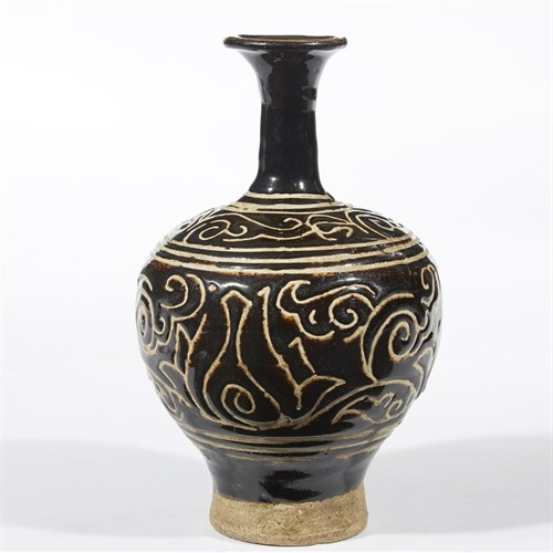 Lot 44 - A Chinese incised black-glazed stoneware bottle vase