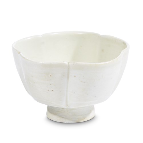 Lot 32 - A small Chinese Dingyao-type five-lobed footed cup