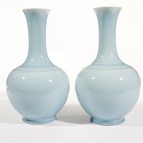 Lot 157 - A pair of "clair de lune"-glazed bottle vases