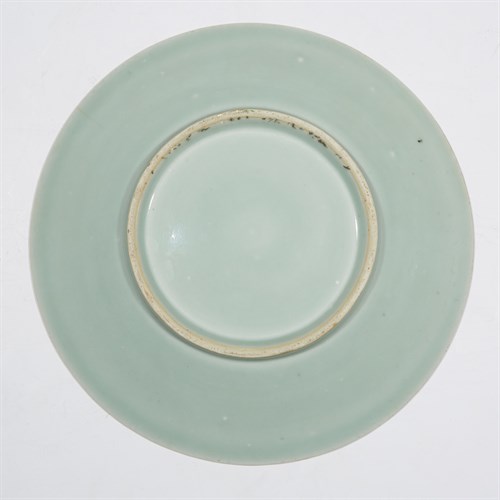 Lot 198 - A Chinese export porcelain celadon-ground "Rose Mandarin" dish