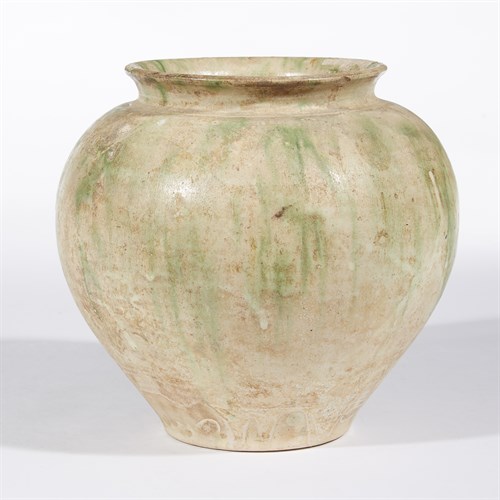Lot 20 - A Chinese green-splashed straw-glazed pottery vase