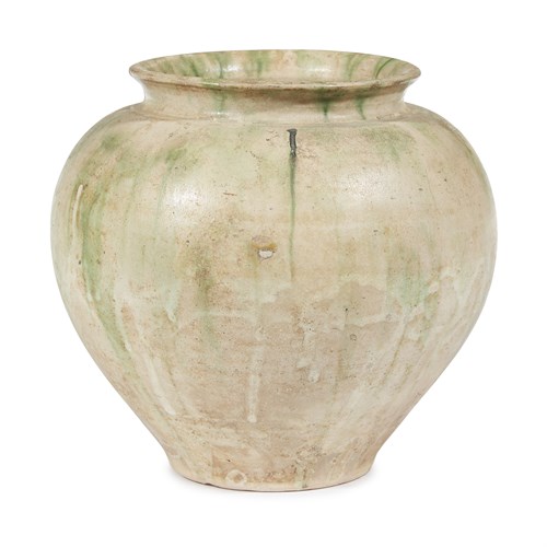 Lot 20 - A Chinese green-splashed straw-glazed pottery vase