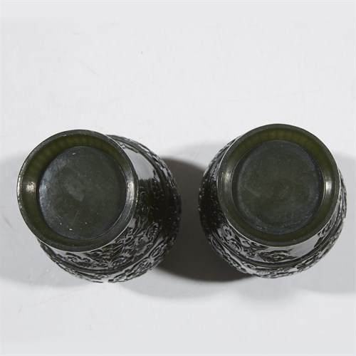 Lot 276 - A pair of finely-carved spinach jade baluster vases