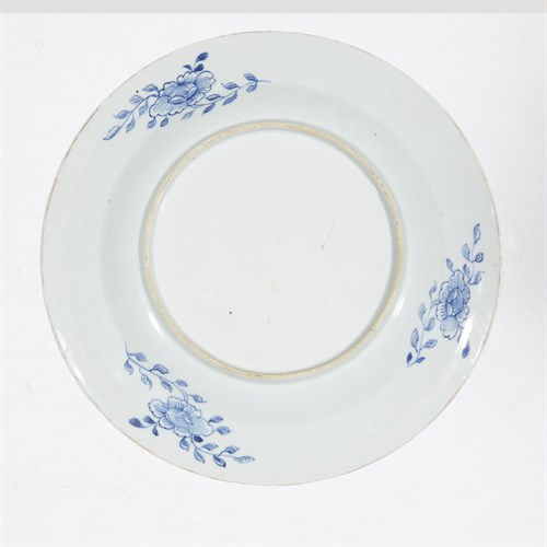 Lot 122 - A pair of Chinese export blue and white porcelain plates decorated with bamboo and peony