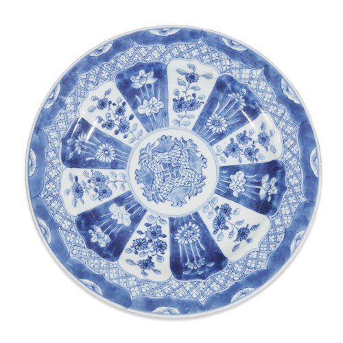 Lot 122 - A pair of Chinese export blue and white porcelain plates decorated with bamboo and peony