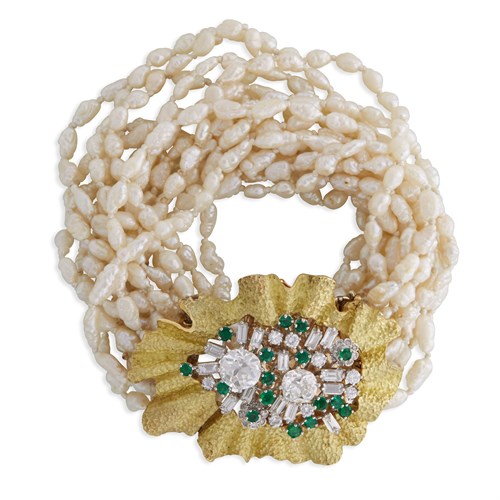 Lot 156 - A diamond, emerald, rice pearl, and eighteen karat gold bracelet