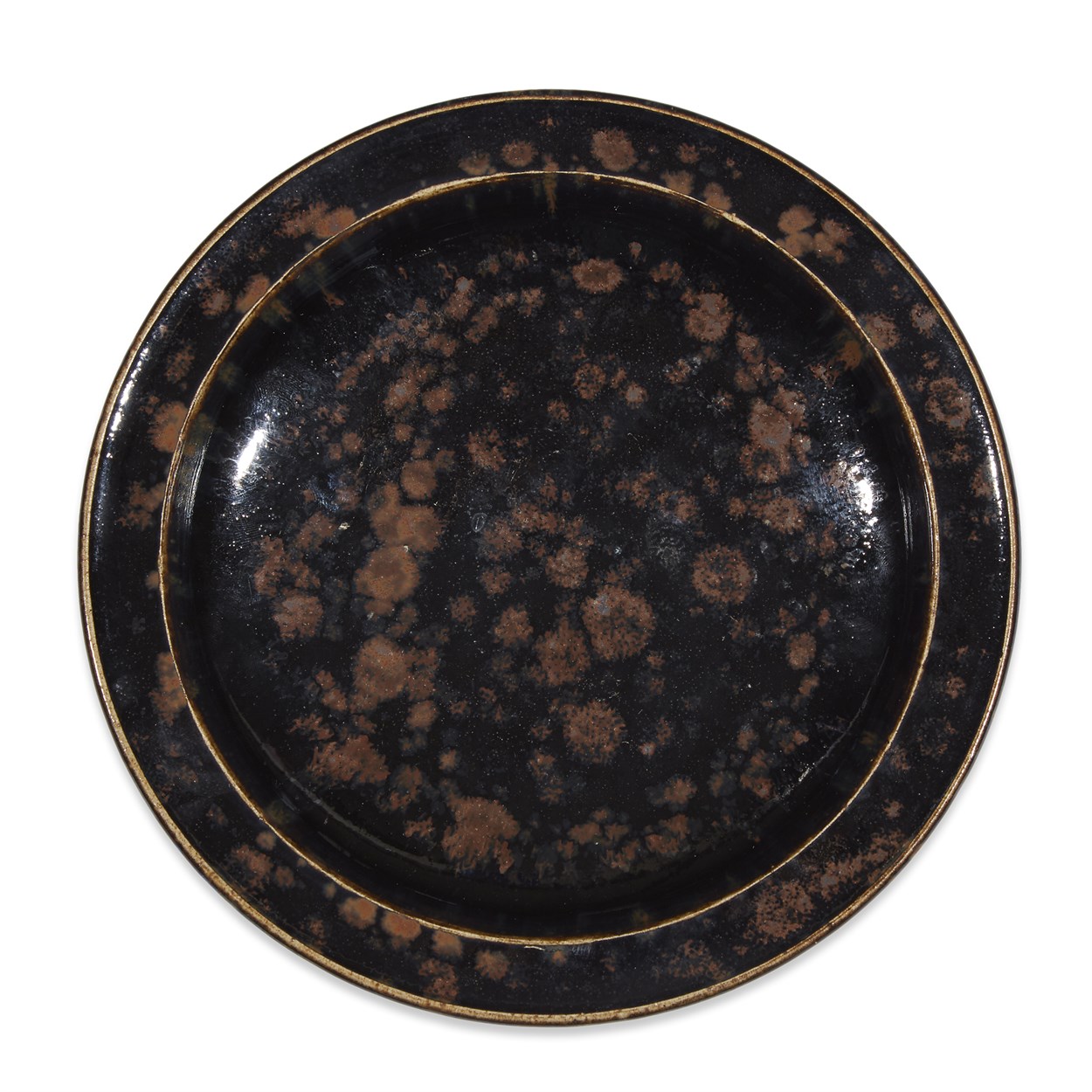 Lot 38 - A Chinese Cizhou russet-splashed black-glazed circular dish