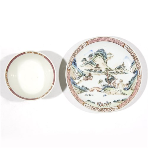 Lot 127 - A Chinoiserie "Landscape" tea bowl, possibly Worcester, together with a similar Chinese export porcelain saucer