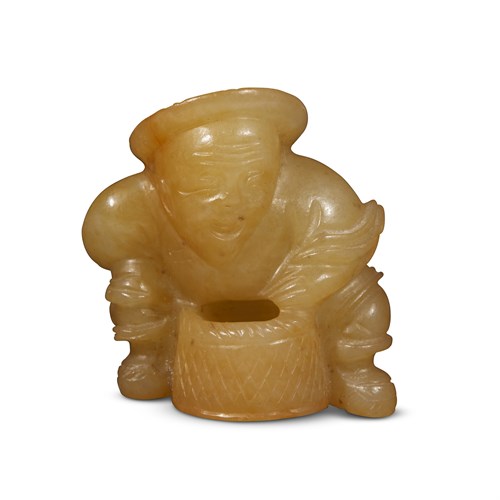 Lot 261 - A Chinese yellow and russet jade toggle of a fishermen