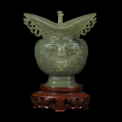 Lot 279 - A Chinese finely carved celadon jade small libation vase