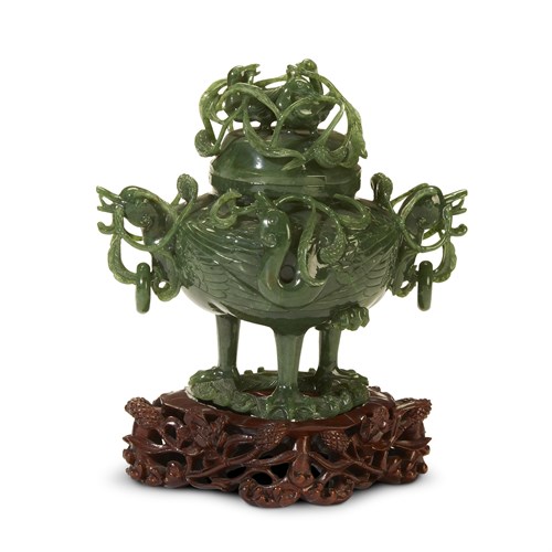 Lot 281 - A Chinese carved "Goose and Millet" spinach jade tripod censer with cover