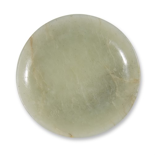Lot 287 - A Chinese carved pale celadon jade circular snuff dish
