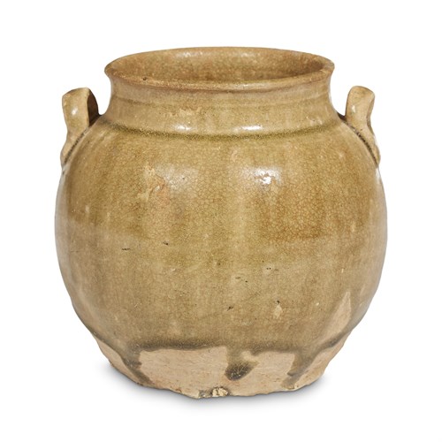 Lot 19 - A Chinese celadon-glazed ceramic jar