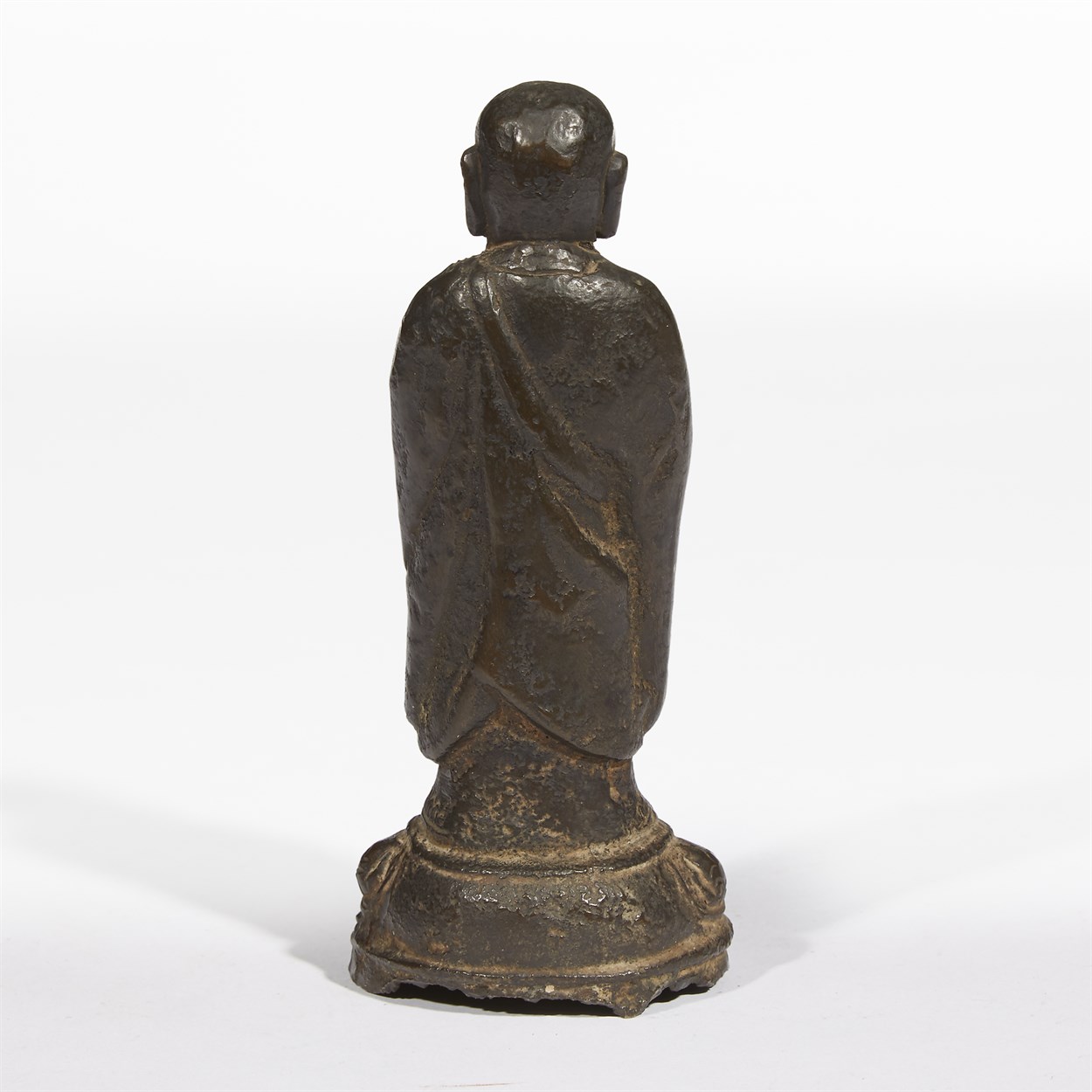 Lot 73 - A Chinese bronze figure of a Buddhist attendant
