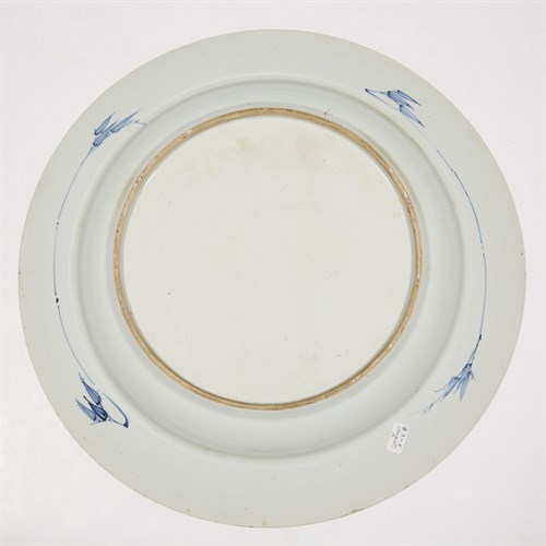 Lot 123 - A Chinese blue and white circular charger with carved border