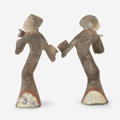 Lot 8 - A pair of Chinese painted grey pottery figures of dancers
