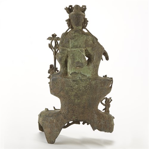 Lot 75 - A Chinese bronze figure of a seated Guanyin