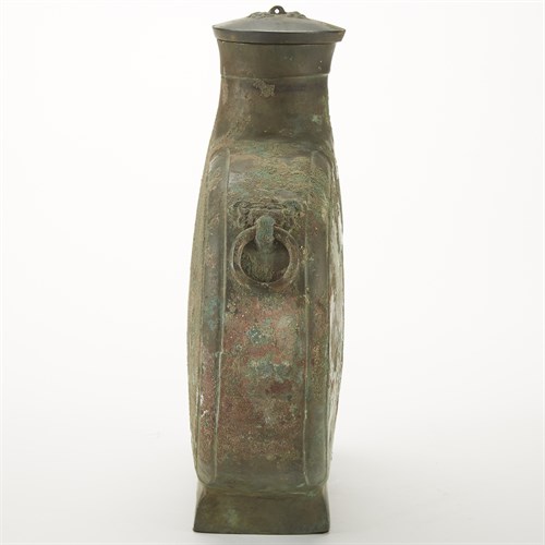 Lot 9 - A Chinese archaic bronze vessel and cover, bianhu