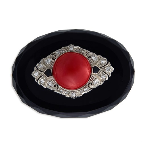 Lot 115 - A coral, onyx, and diamond pendant brooch