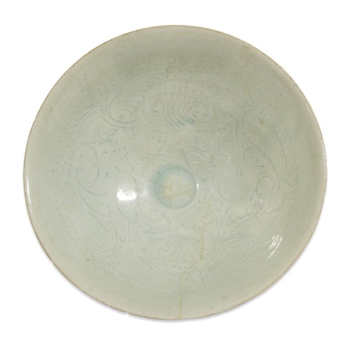 Lot 58 - A Chinese incised qingbai "Boys" bowl