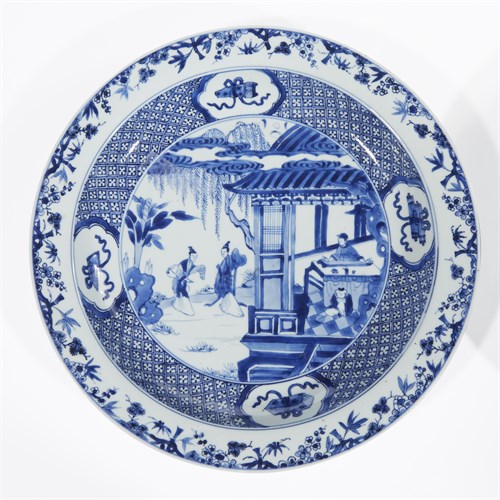 Lot 116 - A pair of Chinese export porcelain blue and white chargers