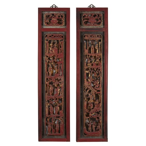 Lot 232 - A pair of Chinese parcel-gilt and lacquered carved and pierced wood panels
