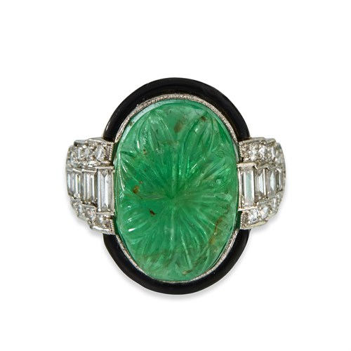 Lot 172 - An Art Deco platinum, emerald, diamond, and enamel ring