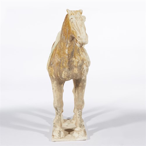 Lot 28 - A Chinese sancai-glazed pottery figure of a horse