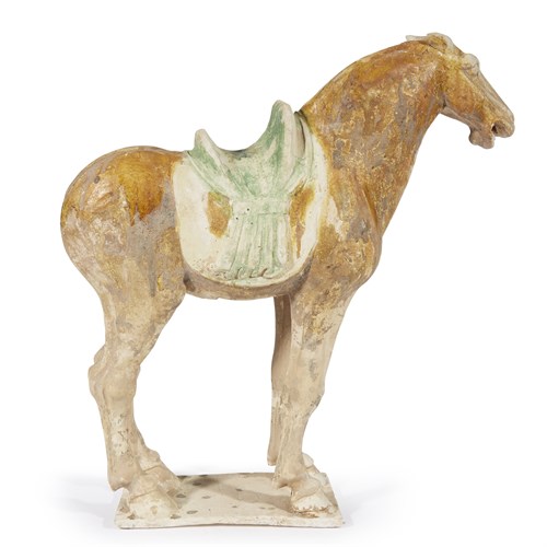 Lot 28 - A Chinese sancai-glazed pottery figure of a horse