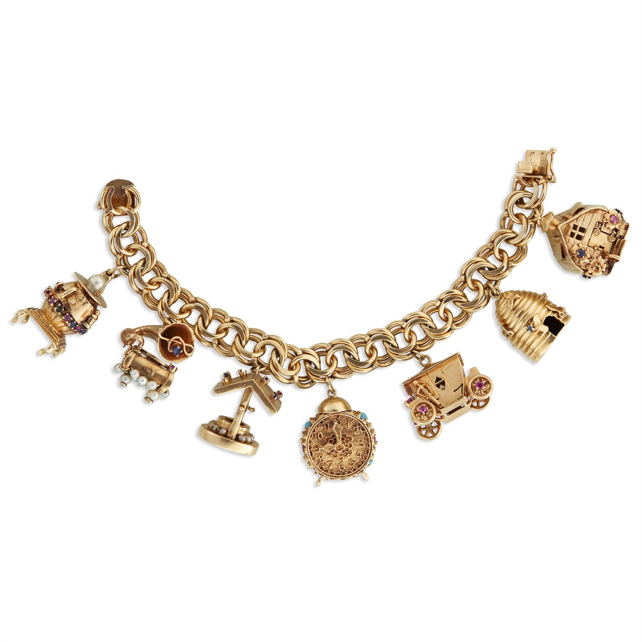 Lot 66 - A fourteen karat gold charm bracelet